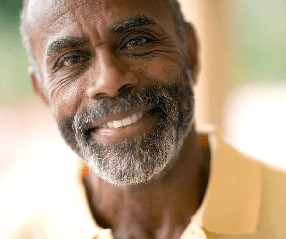 Happy patient after implant treatment